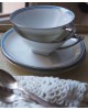 Tasses et sous tasses blanches, décor liseret bleu et argent, porcelaine de  Limoges,  Art Déco.